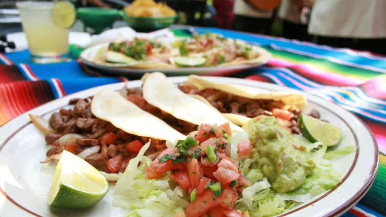 tacos and fresh salsa with limes