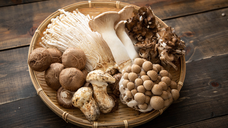 Asian mushrooms on woven dish