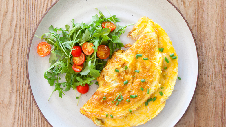 omelet topped with chives