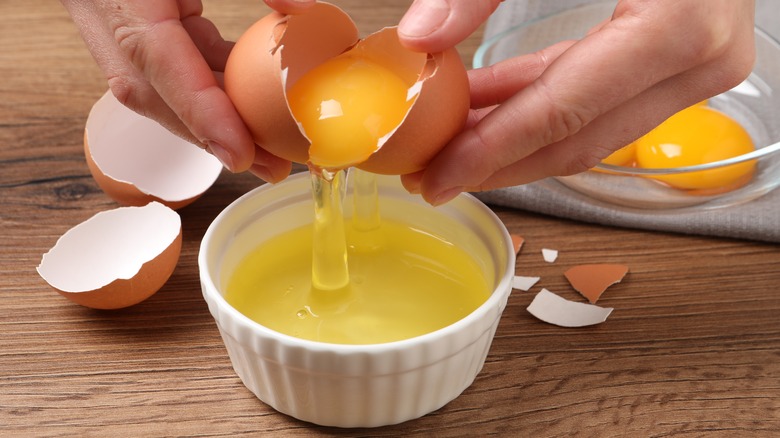 egg being separated into bowl