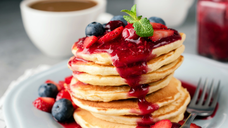 Pancakes with berries and berry sauce