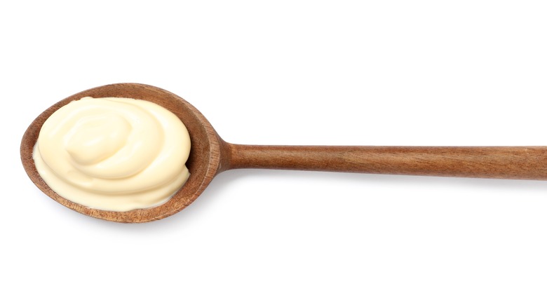 wooden spoon with mayo