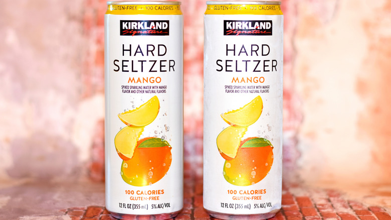 Cans of Kirkland hard seltzer in mango flavor