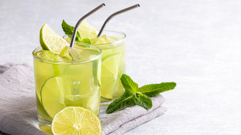 Lime cocktails with metal straws
