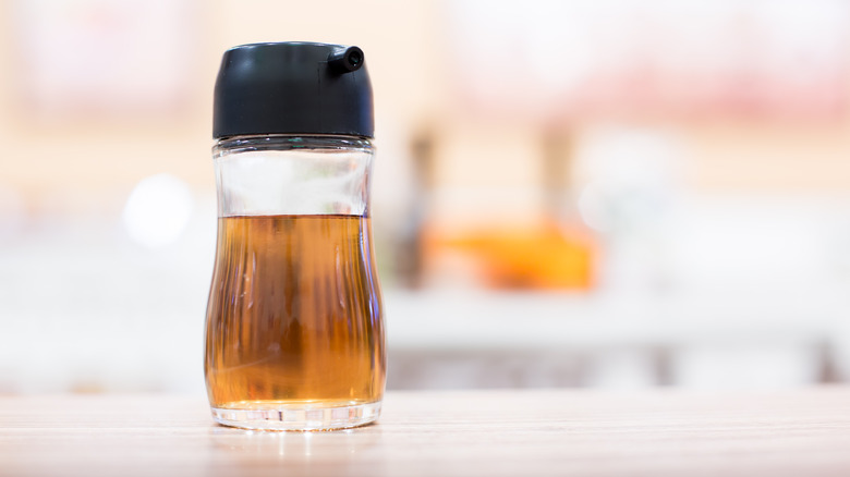 jar of fish sauce on table