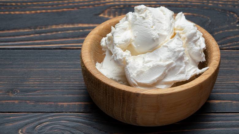 Mascarpone cheese in a wooden bowl