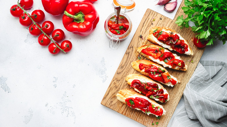 Crispy bruschetta with soft goat cheese and sweet red paprika