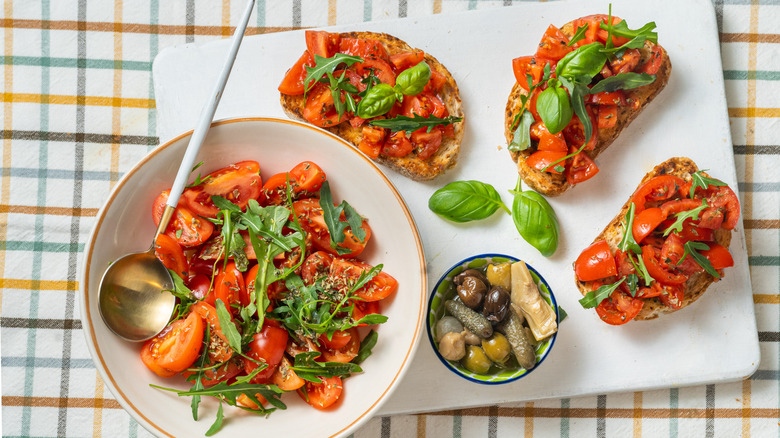 Bruschetta on bread slices and in a bowl