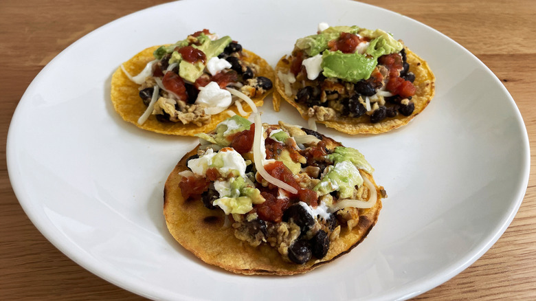 black bean breakfast tacos on white plate