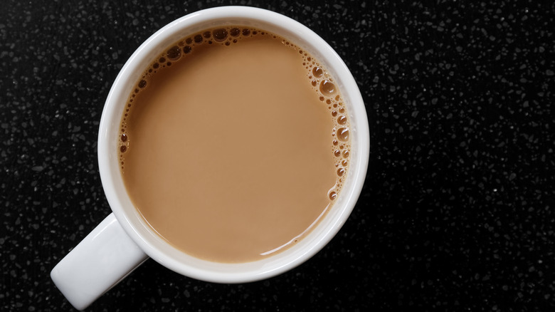 milky tea in ceramic mug