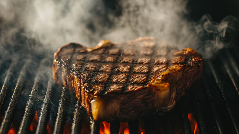 A smoky steak on the grill