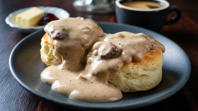 Creamy sausage gravy over two fresh biscuits