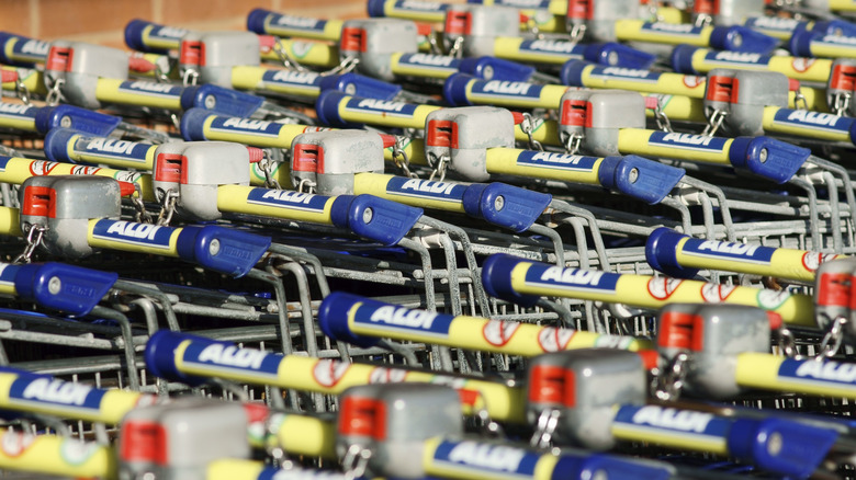 Aldi shopping carts in a row