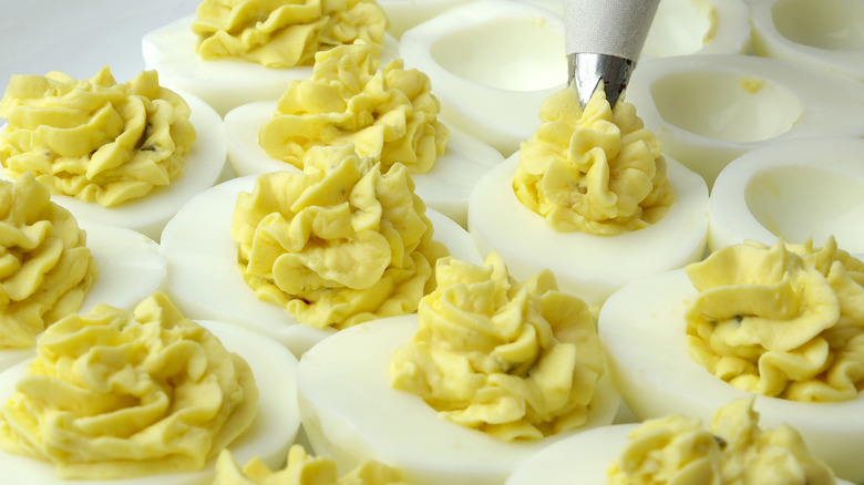 piping fluffy filling for deviled eggs