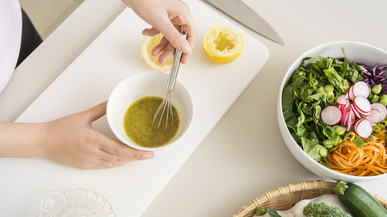 Whisking lemon vinaigrette