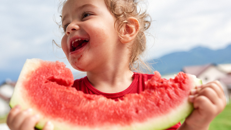 child with watermelon