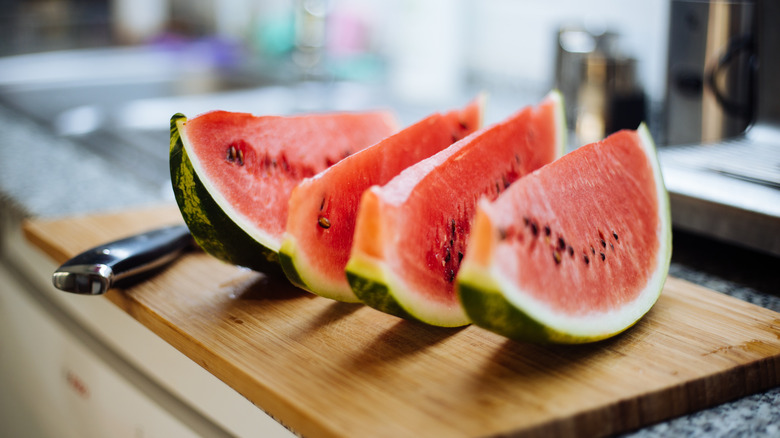 watermelon being sliced