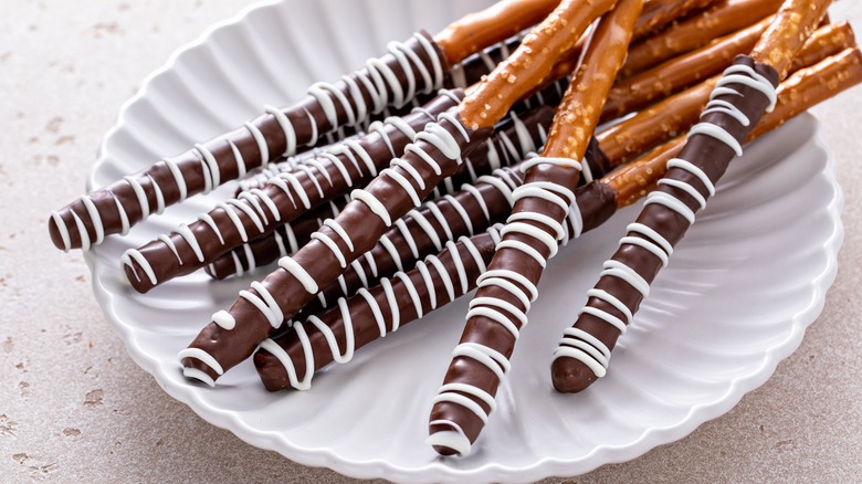 plate of chocolate dipped pretzels