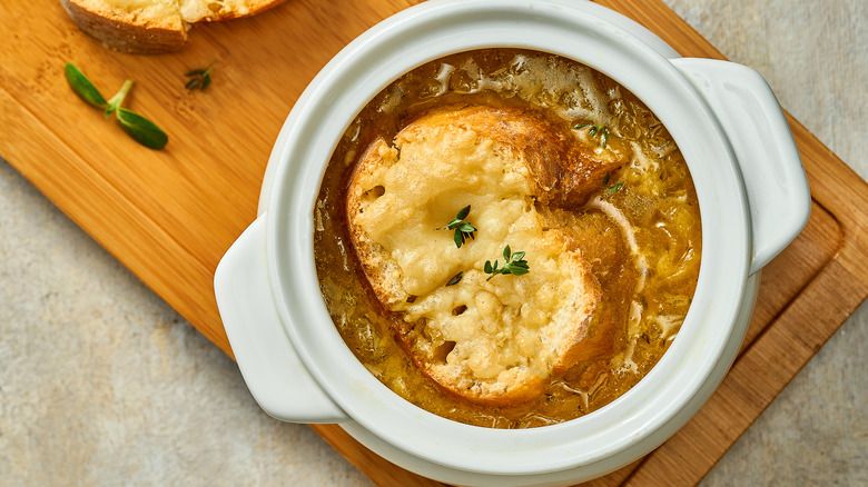 French onion soup in bowl with melted cheese
