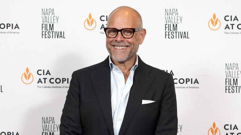 Alton Brown, American television personality, poses for a photo at a film festival red carpet