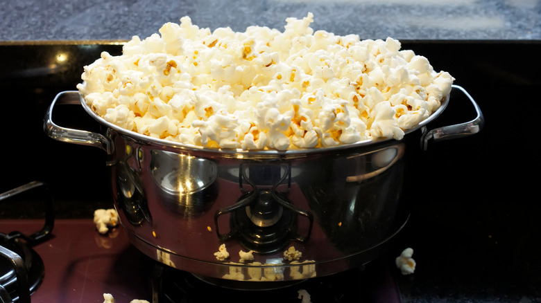 Popcorn in a pot on a stove
