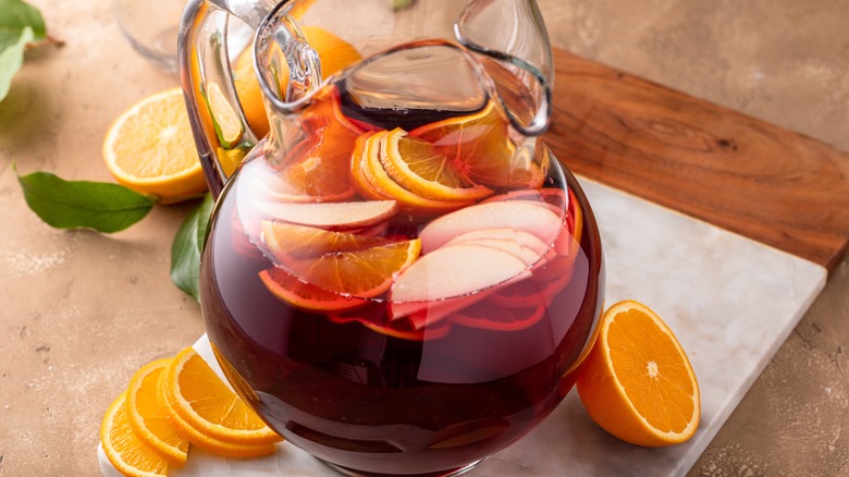 Sangria with fruit in pitcher