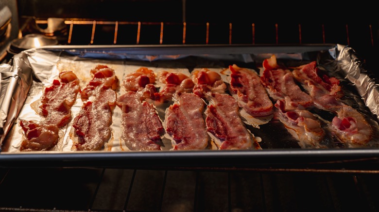 Bacon in the oven on a sheet lined with foil