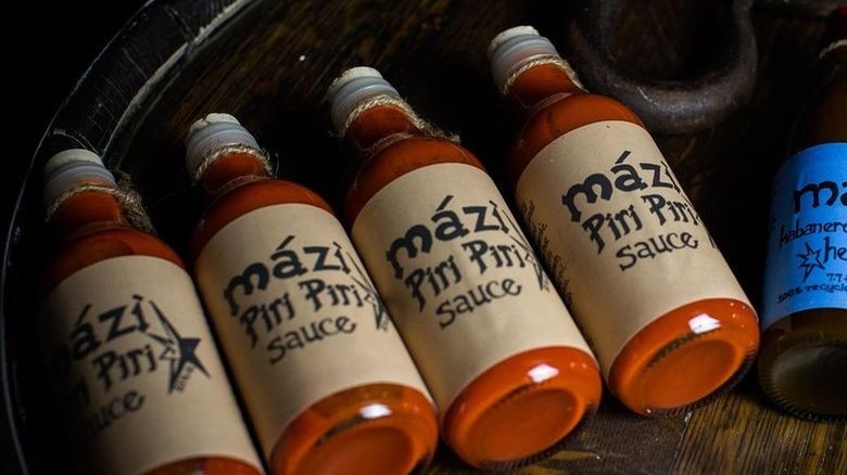 bottles of Mazi peri peri sauce