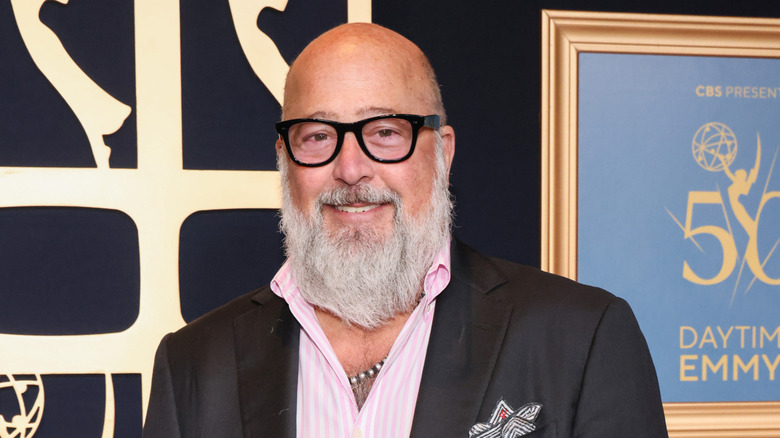 Chef Andrew Zimmern smiling at an event