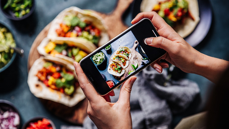 Taking picture of tacos on mobile phone