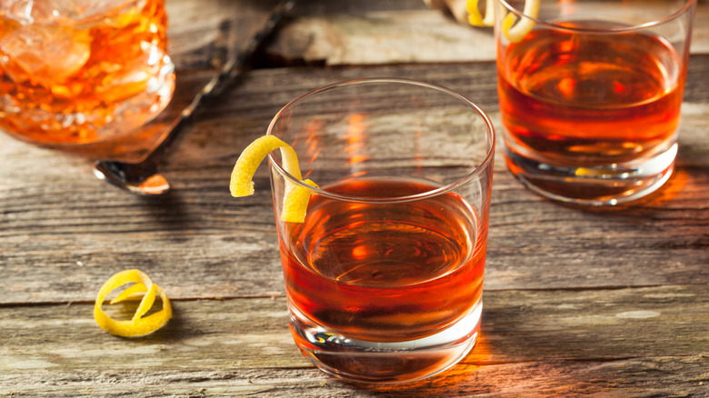 Two glasses of sazerac cocktail