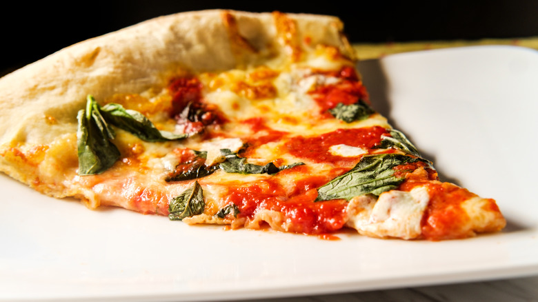 Slice of New York-style margherita pizza