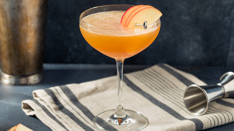 cocktail with apple garnish