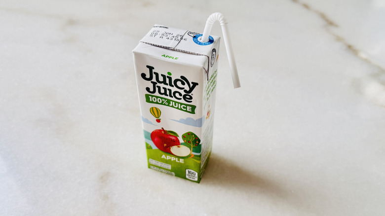 Juicy Juice 100% Apple juice box with straw