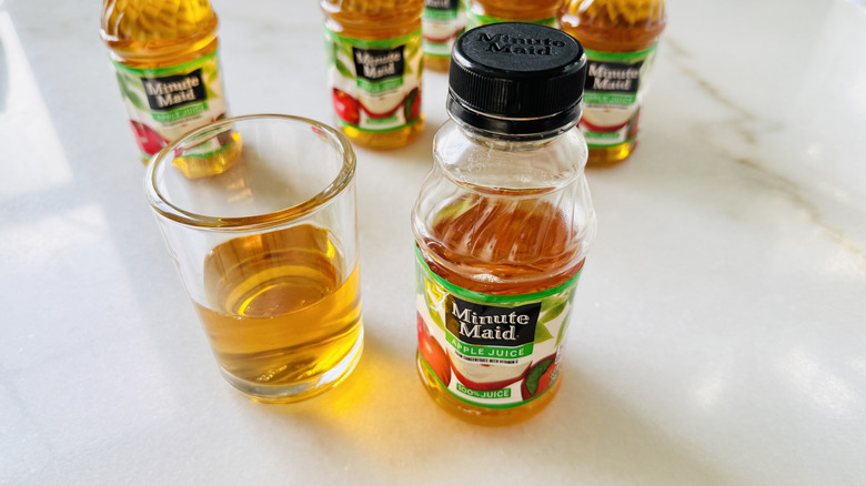 Minute Maid 100% Apple Juice with juice glass