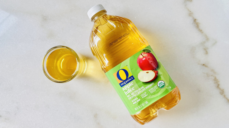 O Organics 100% Apple Juice jug and juice glass