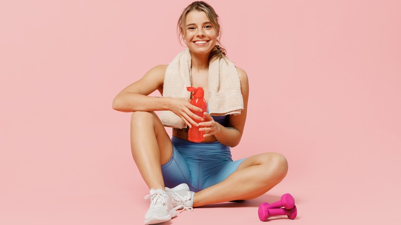 Athlete hydrating after exercise