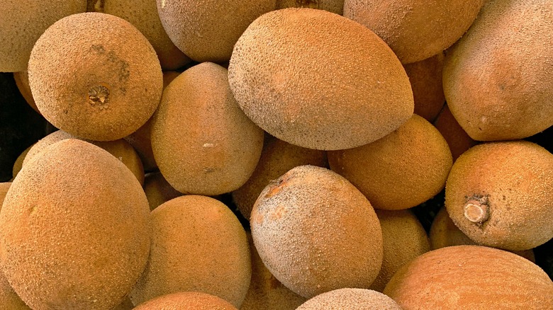 A pile of mamey apples