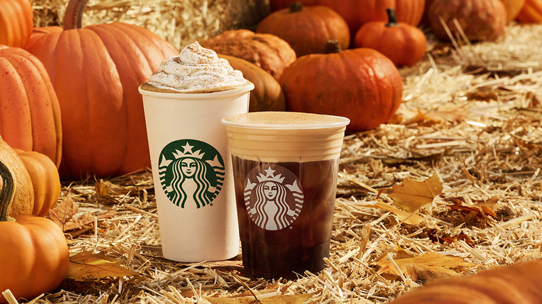 Starbucks fall drinks near pumpkins