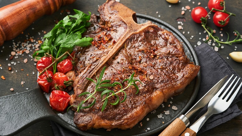 Grilled T-bone or porterhouse steak with herbs