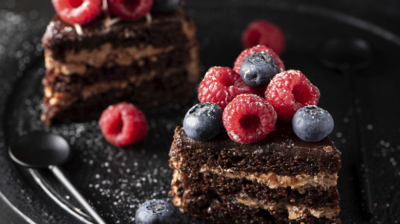 chocolate cake with berries on top 