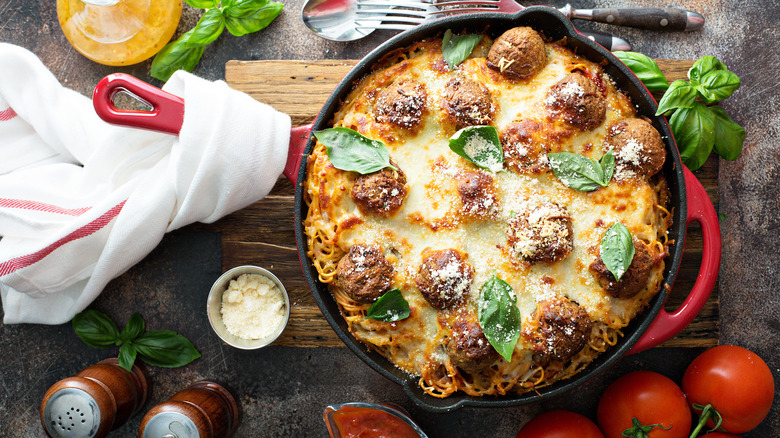 Baked spaghetti with meatballs in a griddle