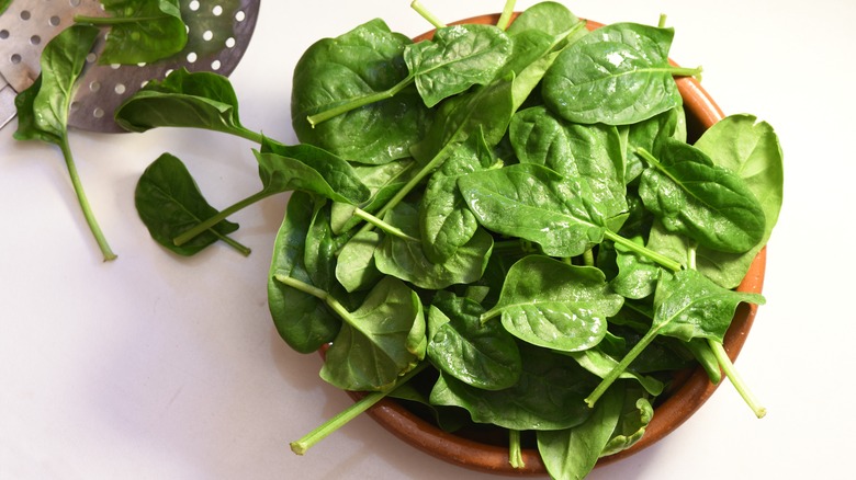 A bowl of spinach leaves