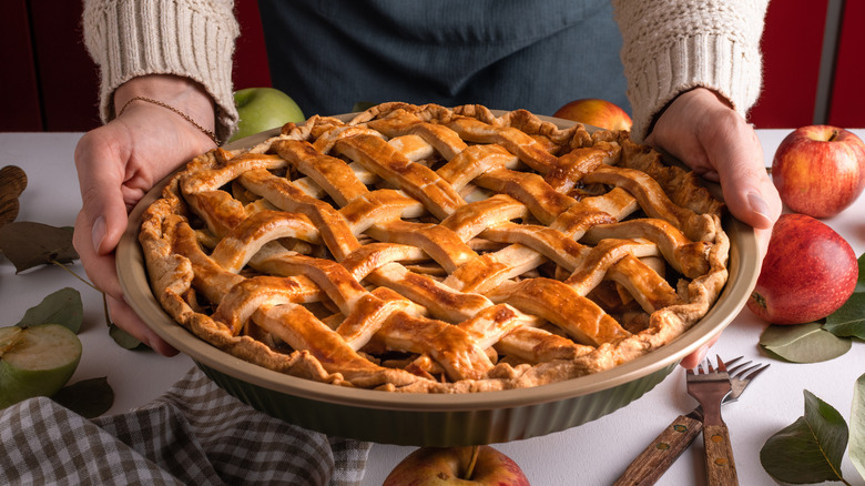 an apple pie with a lattice crust