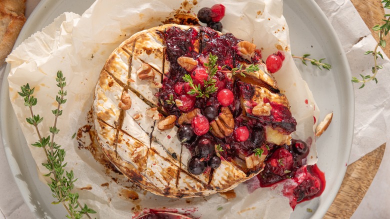 baked brie with fruit and nuts on top