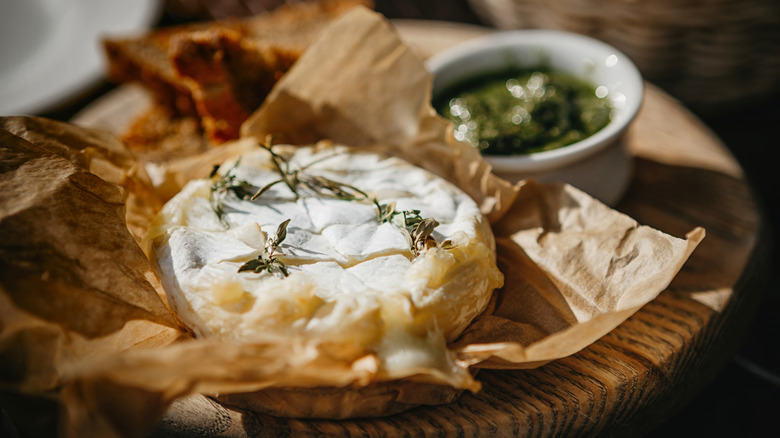 Baked or smoked brie with fresh herbs