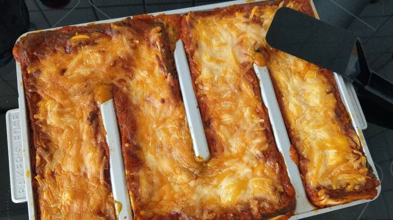 Cheesy lasagna baked in edge pan