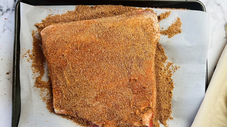 seasoned brisket on pan