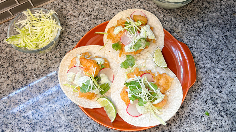 shrimp tacos with cabbage slaw and cilantro