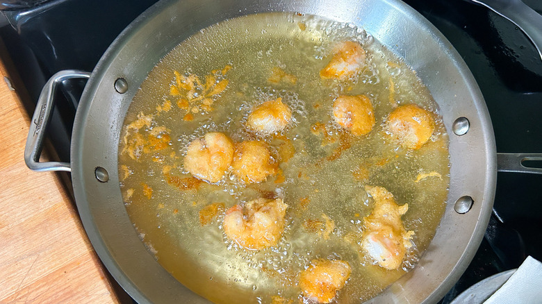 shrimp frying in oil